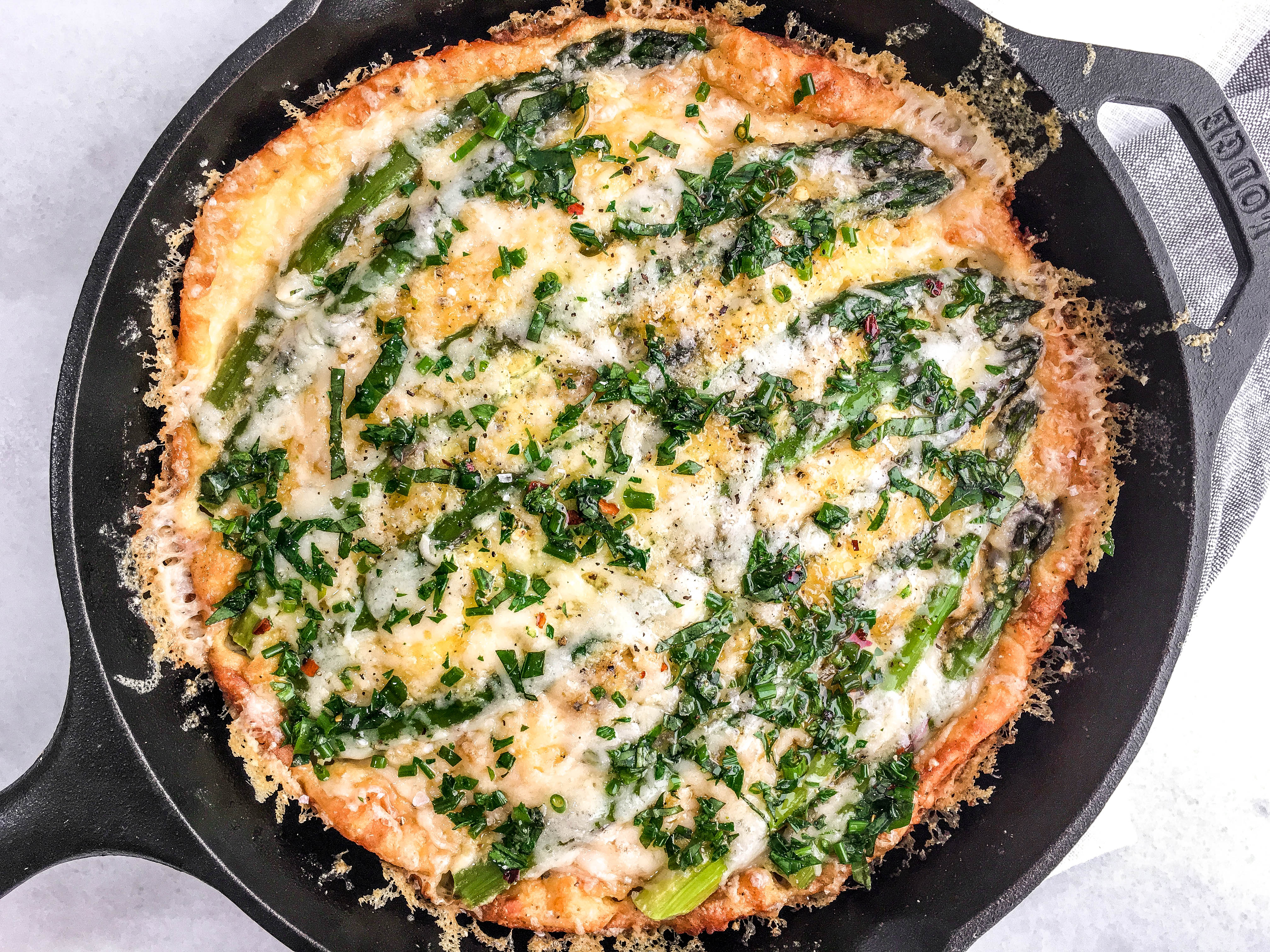Asparagus and Cheese Dutch Baby with Spicy Herb Oil