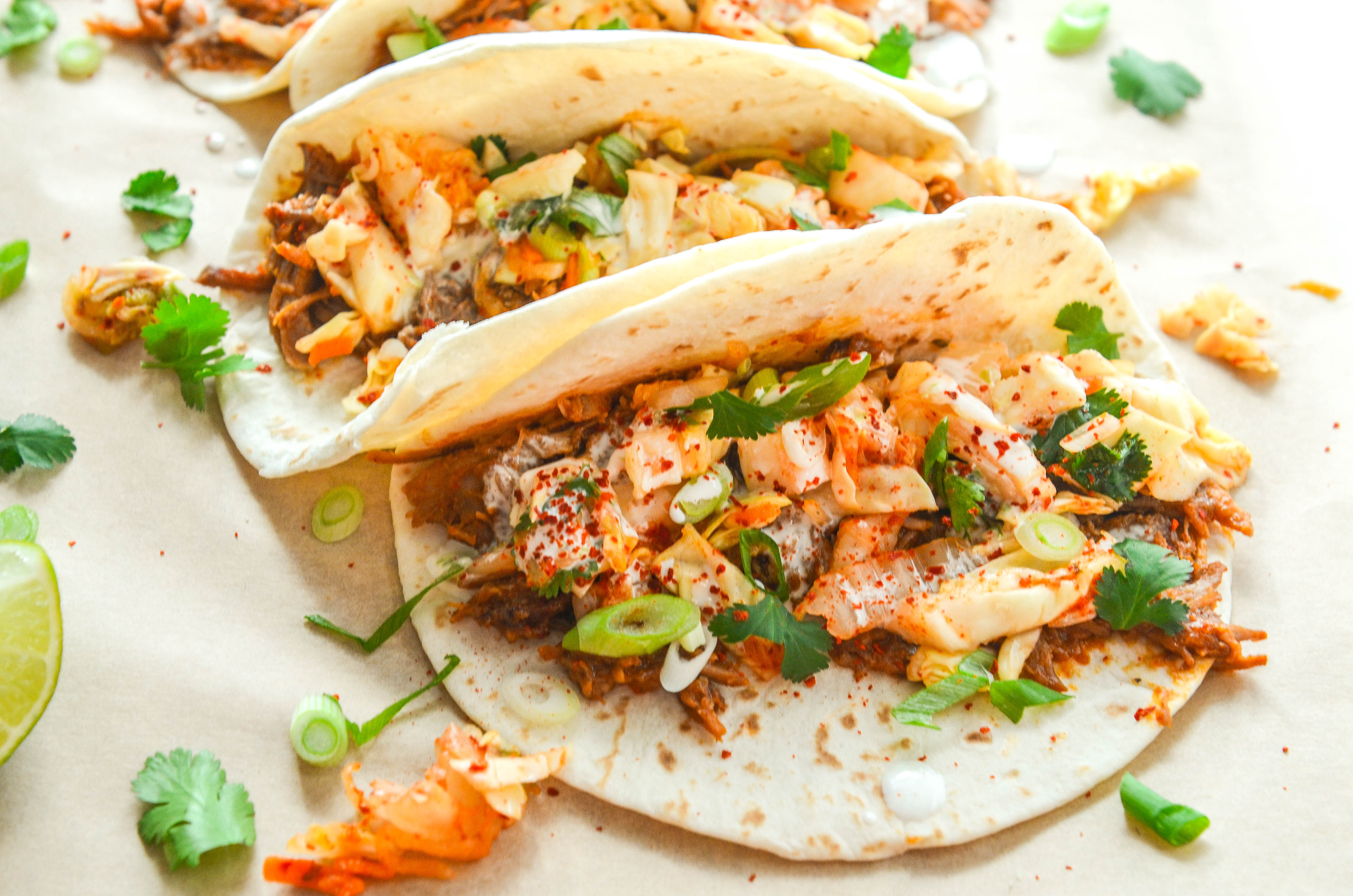 Korean Pork Tacos with Kimchi Slaw & Mirin Crema.jpg