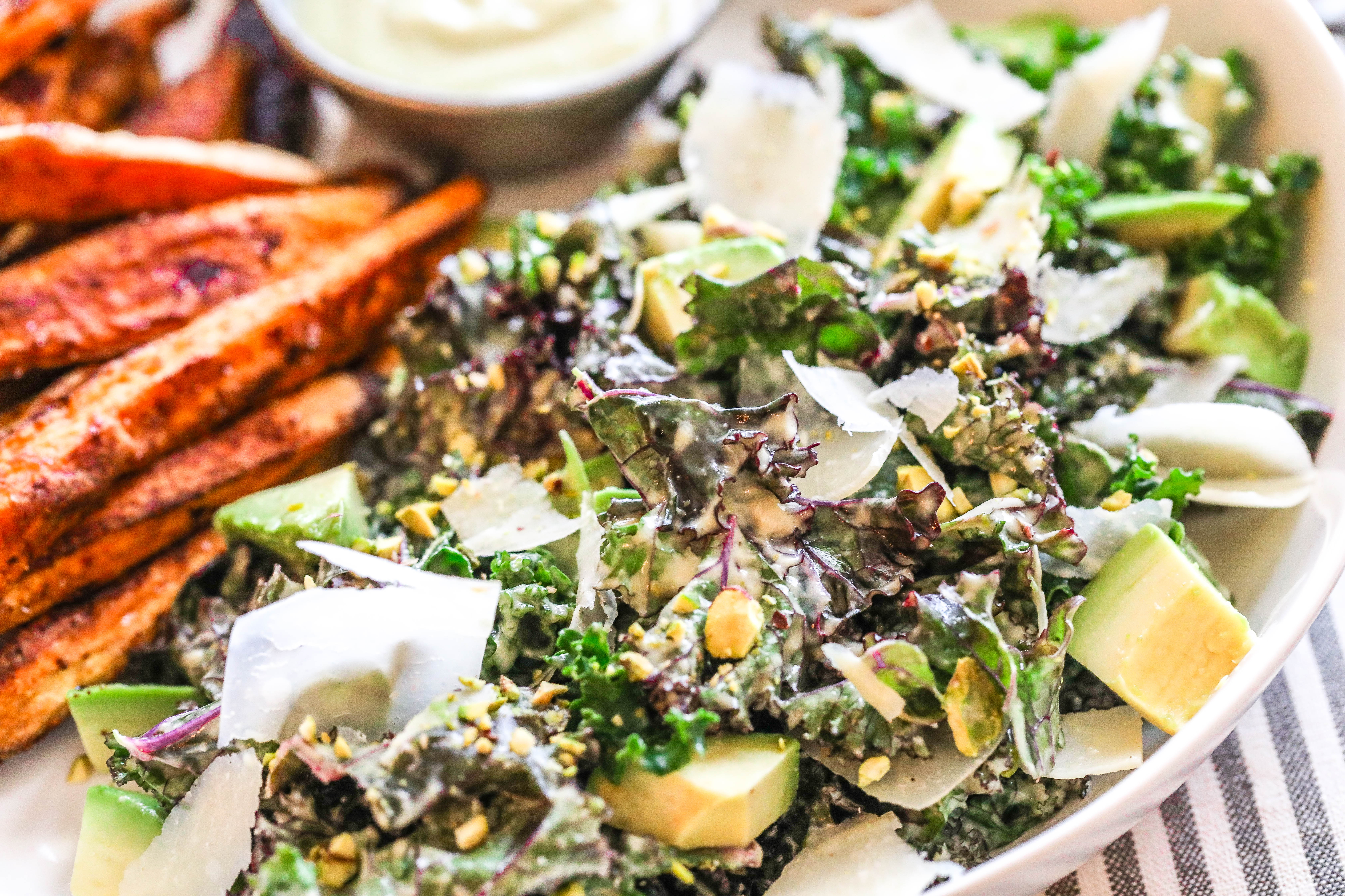 Avocado Kale Caesar Salad with Baked Sweet Potato Fries