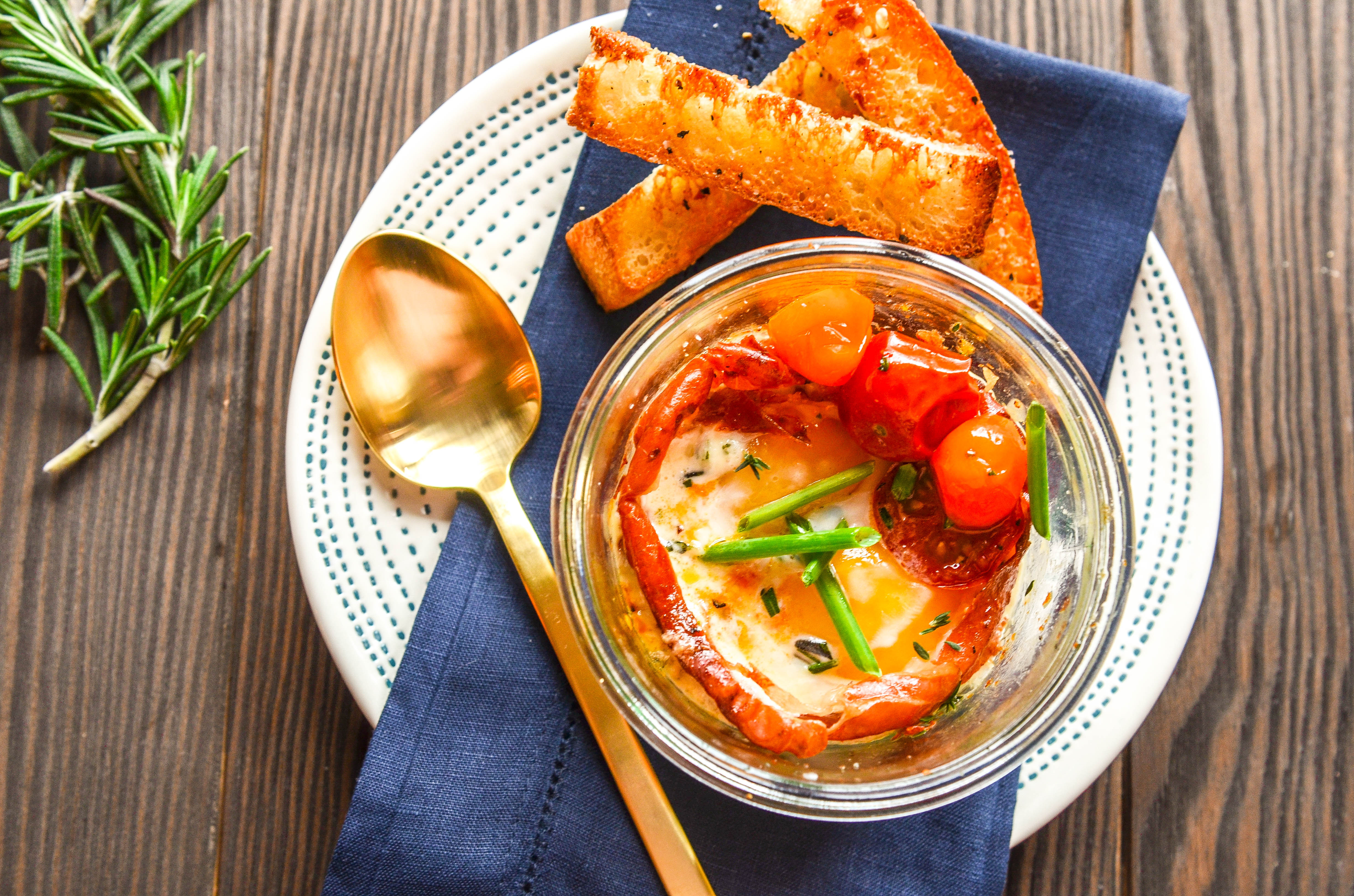 Shirred Eggs with Prosciutto, Candied Tomatoes and Herb Cream with Focaccia Toast Soldiers.jpg